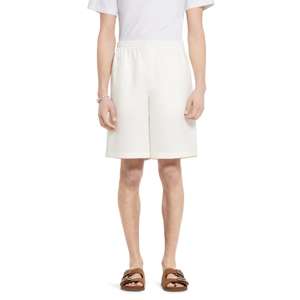 Linen shorts with embossed logo