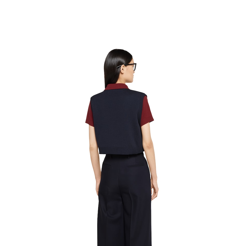 Polo en laine et soie avec gilet superposé