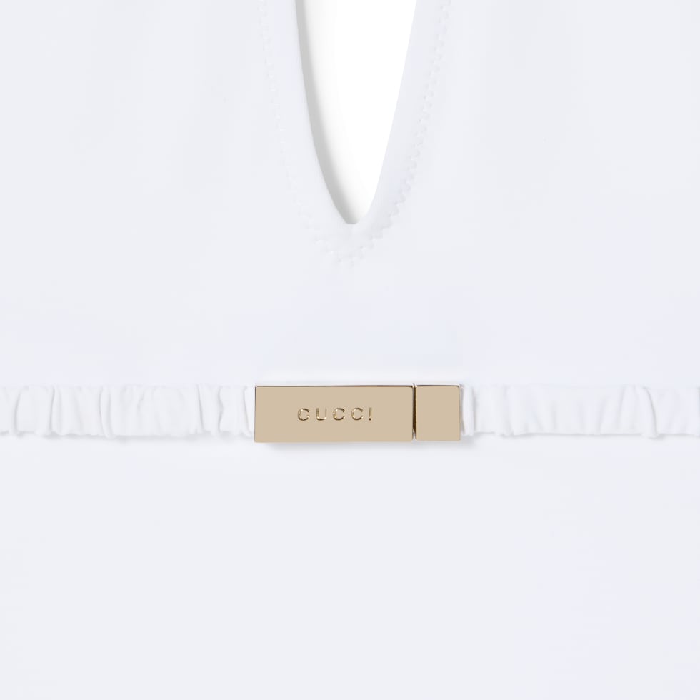 Jersey bodysuit with metal tag