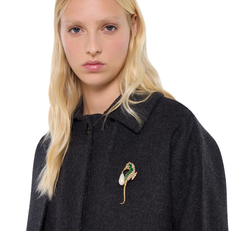 Seahorse-shaped brooch with pearl