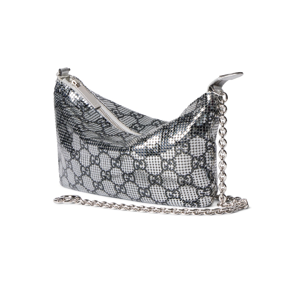 Metallic evening bag with charm