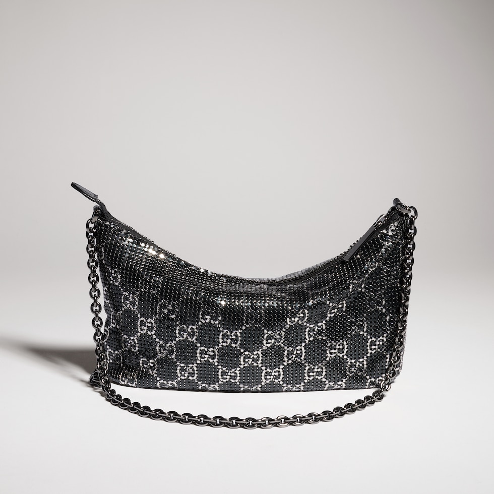 Metallic evening bag with charm
