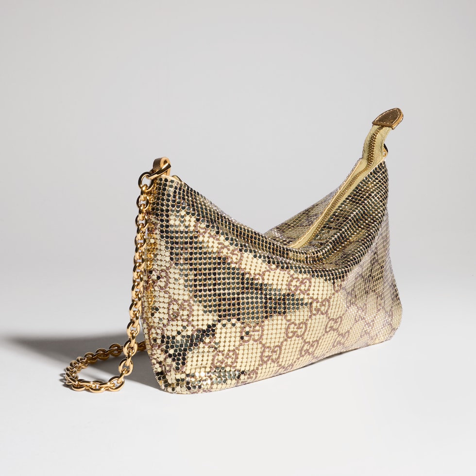 Metallic evening bag with charm