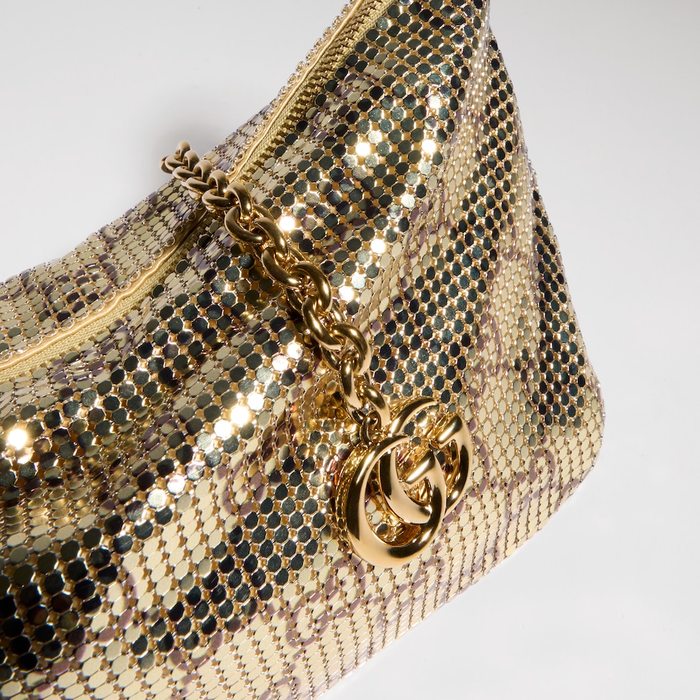 Metallic evening bag with charm