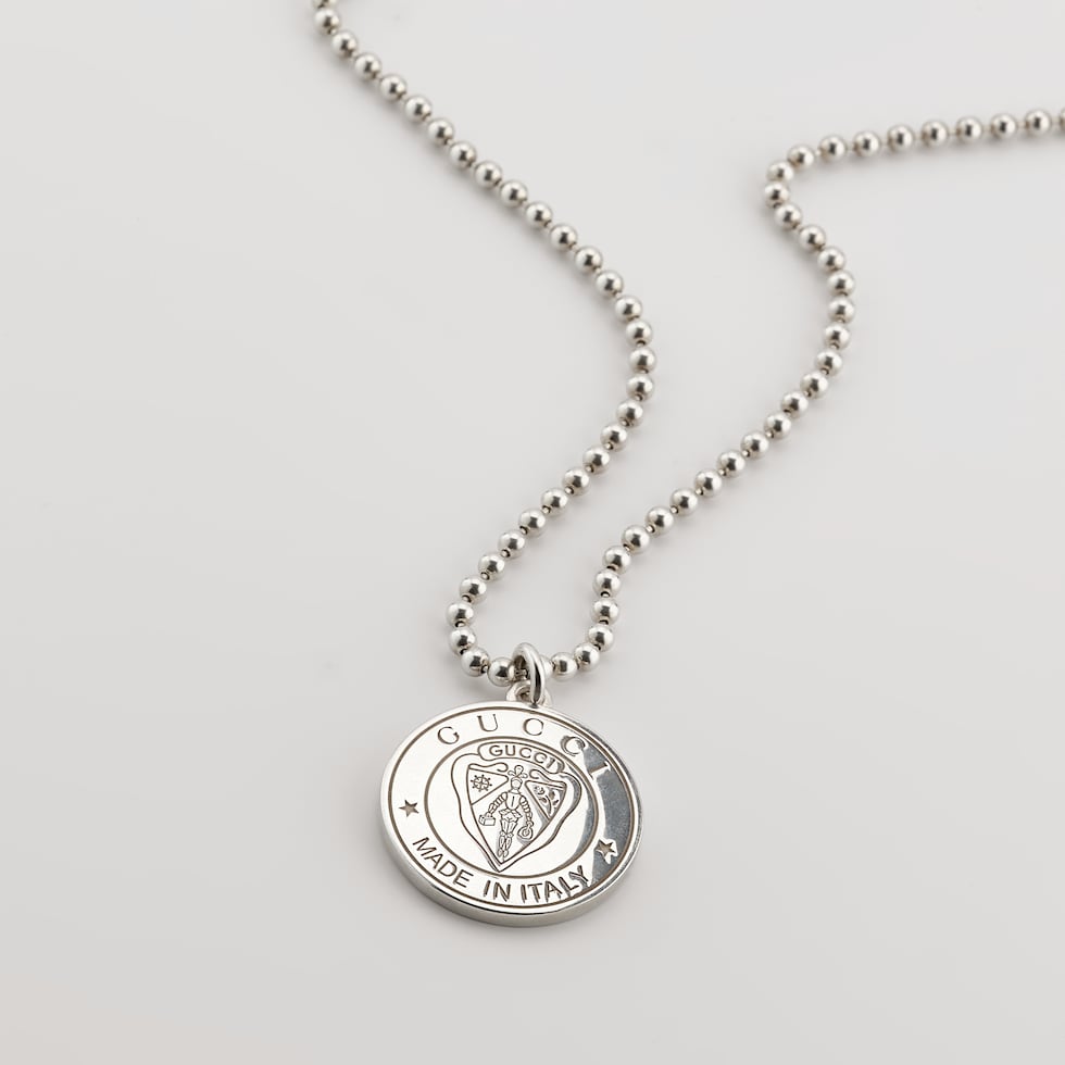 Gucci crest pendant necklace