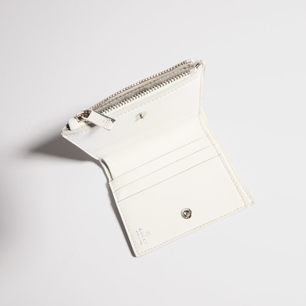 Small perforated GG wallet
