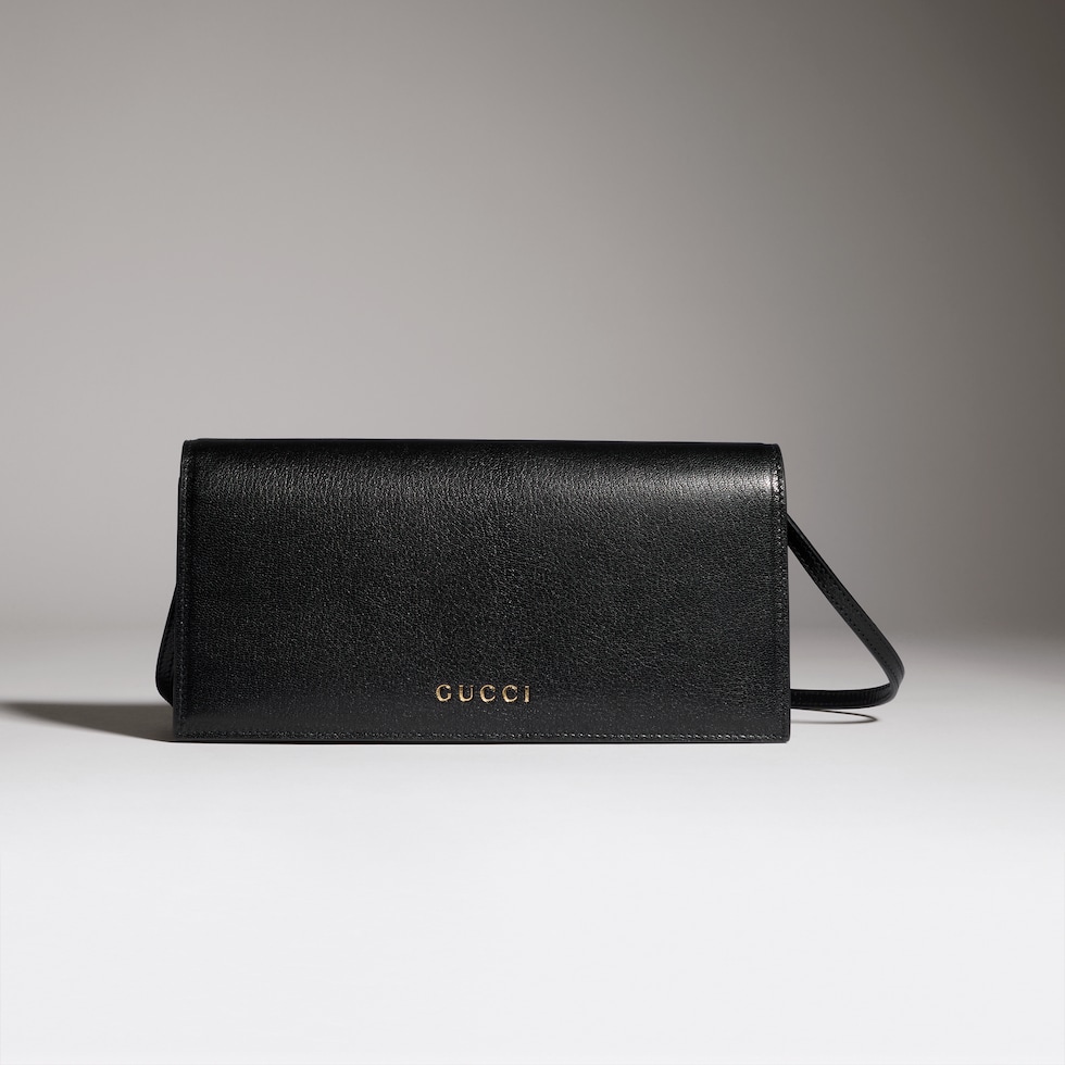 Mini bag with Gucci lettering