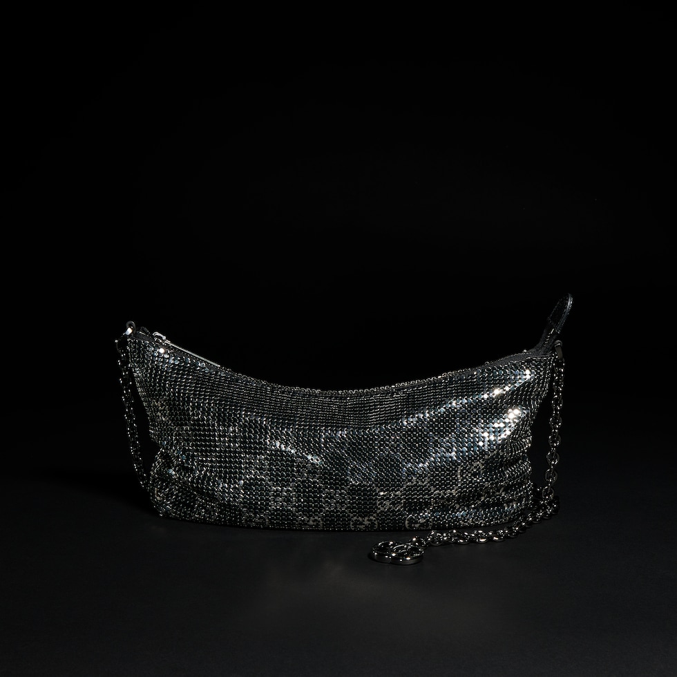 Metallic evening bag with charm