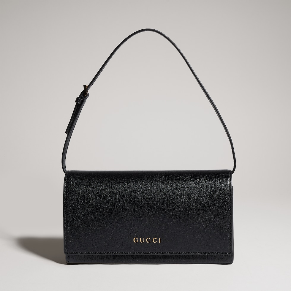 Mini pouch with Gucci lettering