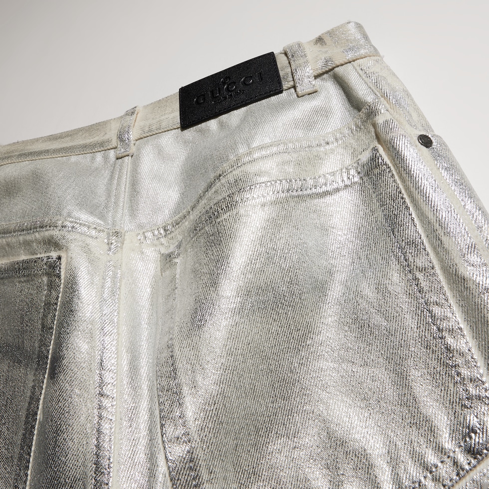 Pantalon en denim de coton enduit