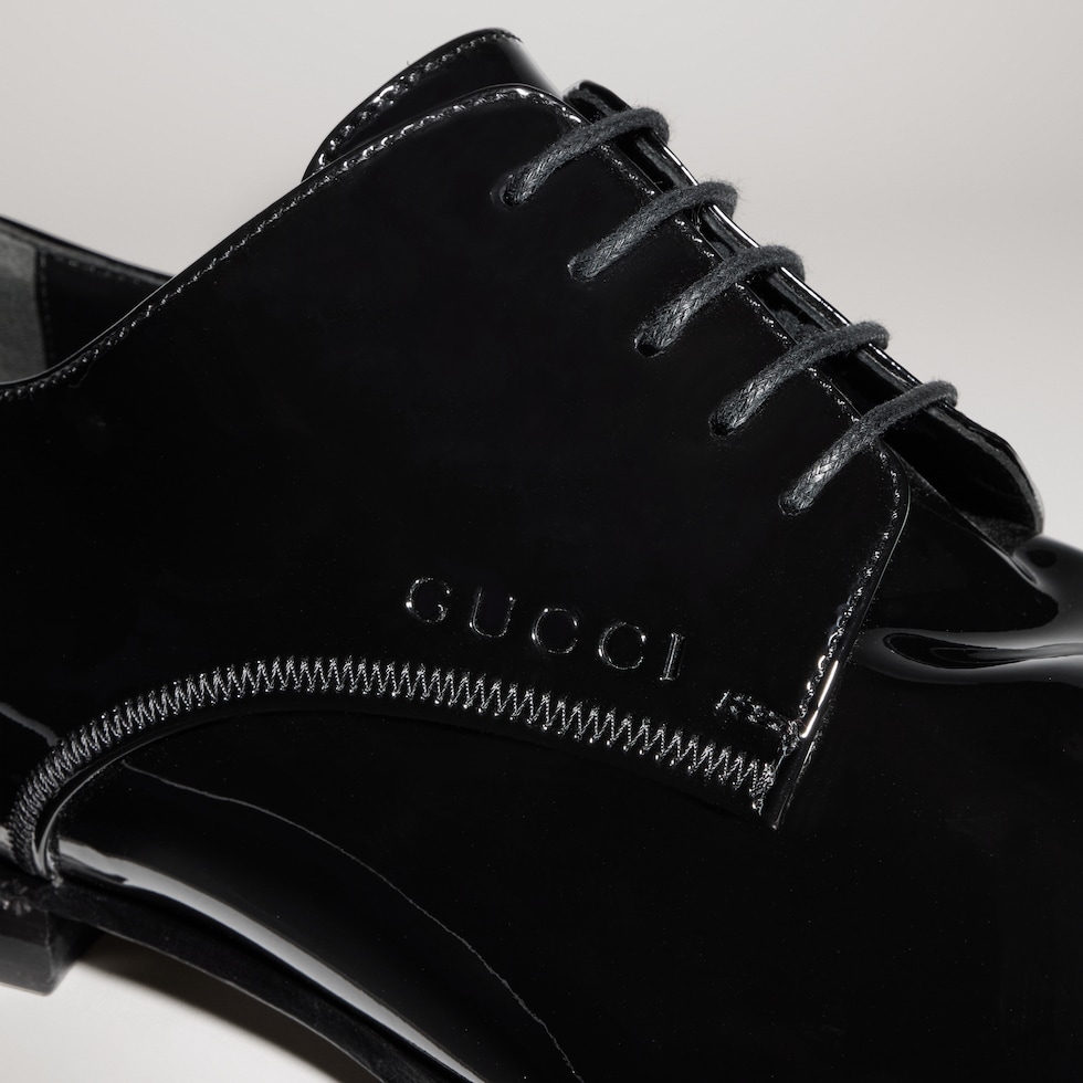 Men's lace-up shoe with embossed logo
