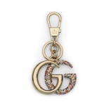 Crystal Double G keychain in light gold-toned metal | GUCCI® US