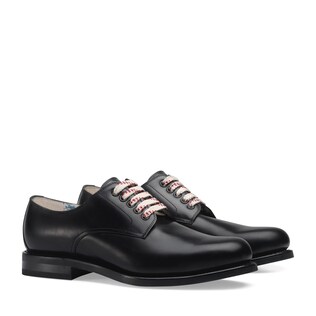 Black leather lace-up shoe