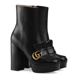 Leather platform ankle boot with fringe