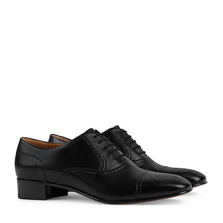 Leather lace-up with brogue detail