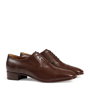 Leather lace-up with brogue detail