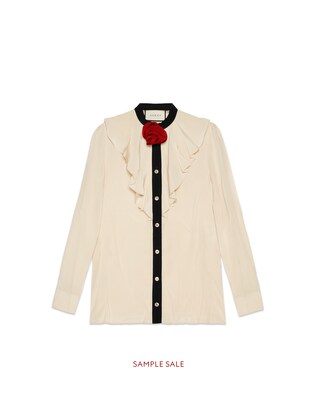 Silk shirt with rose brooch